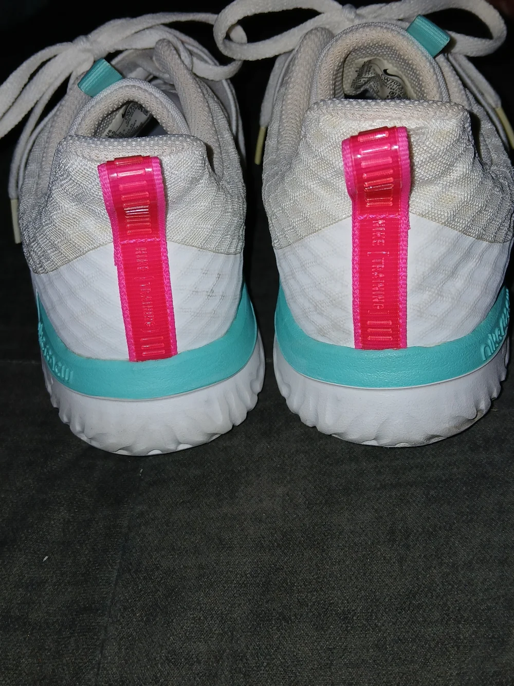 Nike Women’s White Athletic Sneakers with Pink Accents